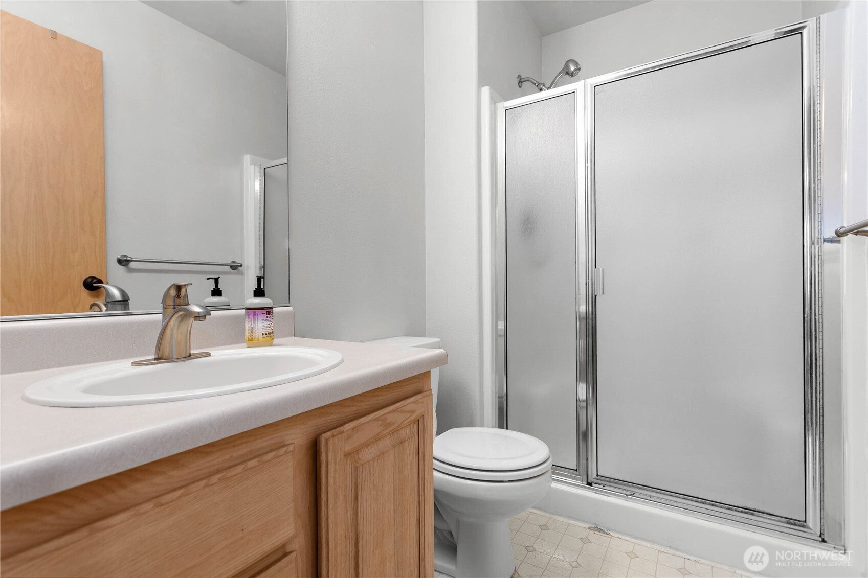 641 West Horton Way, Unit 230 Bellingham, WA 98226 - Photo 15 of 24 a bathroom with a sink a toilet and shower