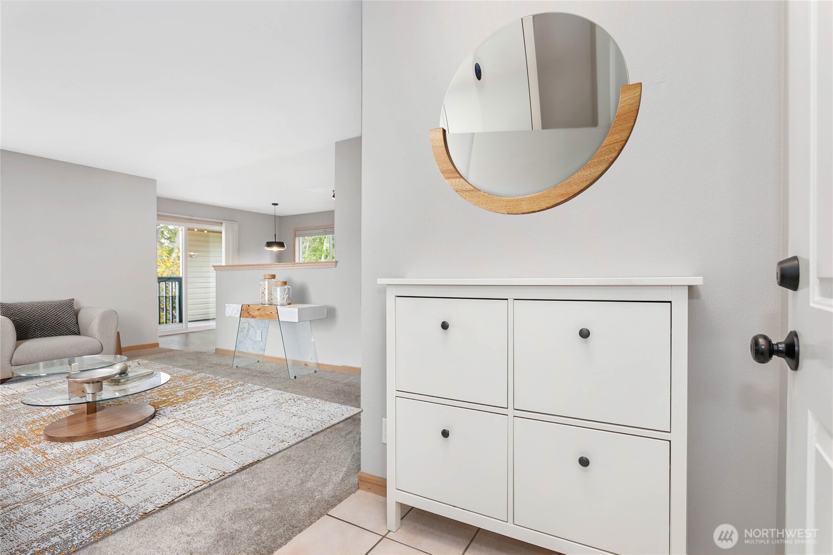 641 West Horton Way, Unit 230 Bellingham, WA 98226 - Photo 3 of 24 a living room with furniture and a wooden floor