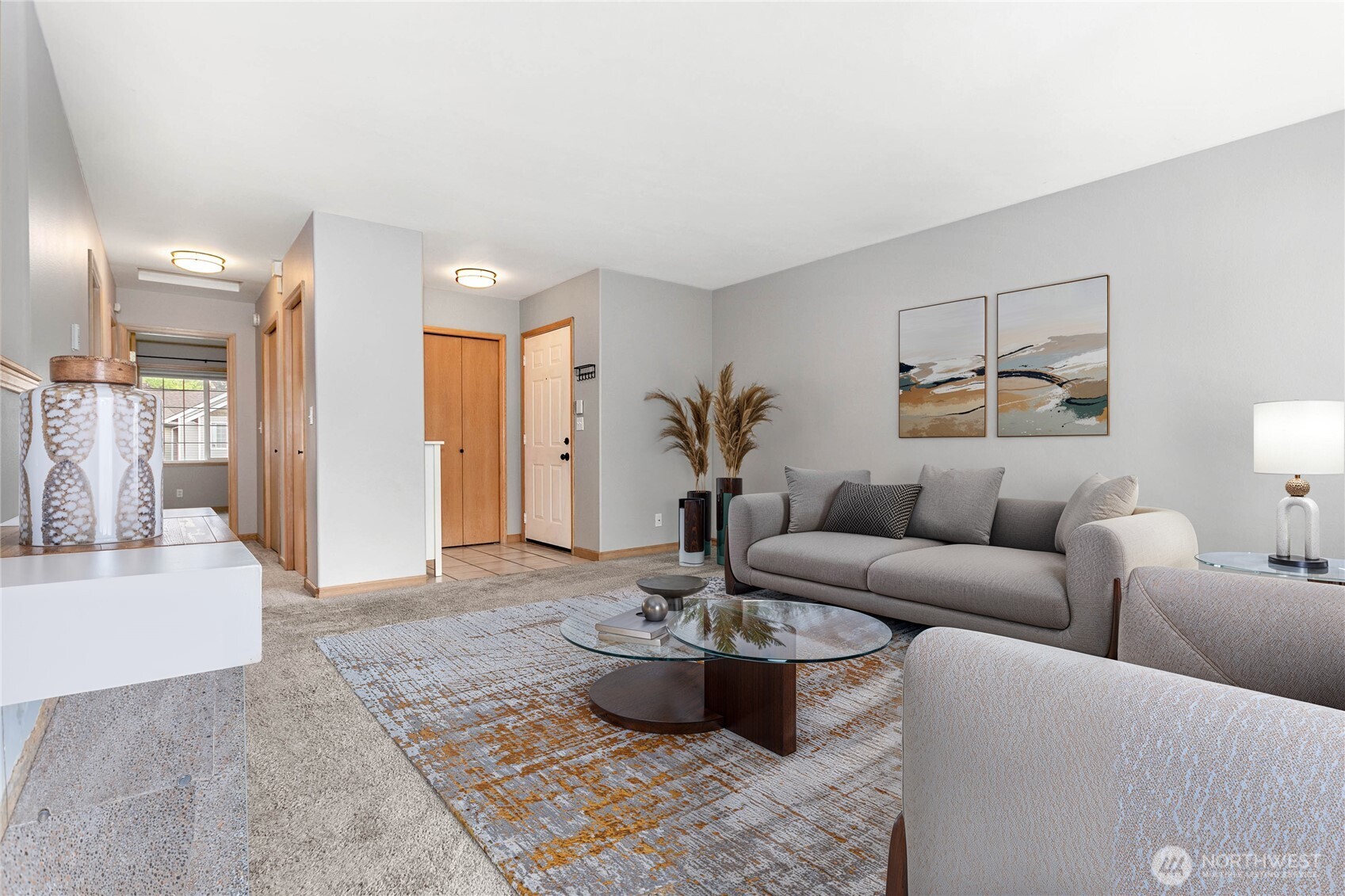 641 West Horton Way, Unit 230 Bellingham, WA 98226 - Photo 5 of 24 a living room with furniture and a potted plant