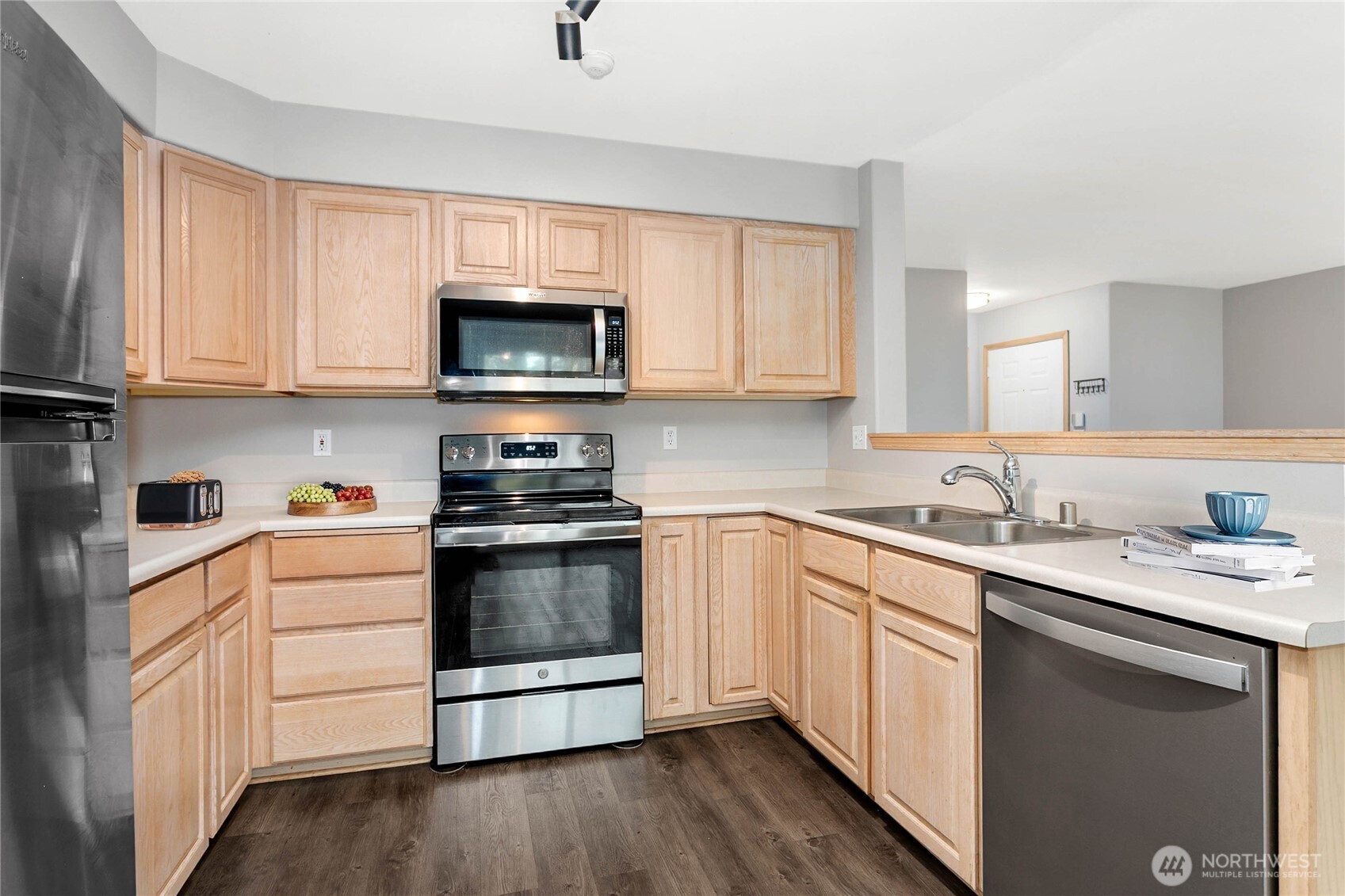 641 West Horton Way, Unit 230 Bellingham, WA 98226 - Photo 8 of 24 a kitchen with a sink stove and microwave