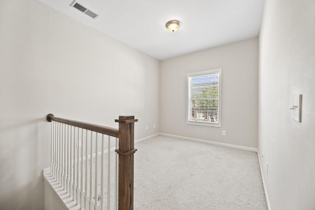 100 Trailside Way Hiram, GA 30141 - Photo 13 of 28 a view of hallway with stairs and a window
