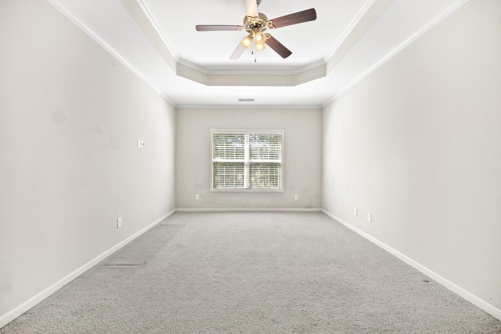100 Trailside Way Hiram, GA 30141 - Photo 15 of 28 an empty room with a window and a ceiling fan