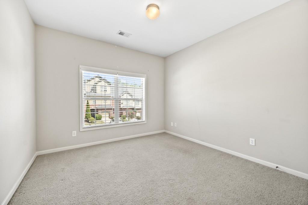 100 Trailside Way Hiram, GA 30141 - Photo 20 of 28 an empty room with a window