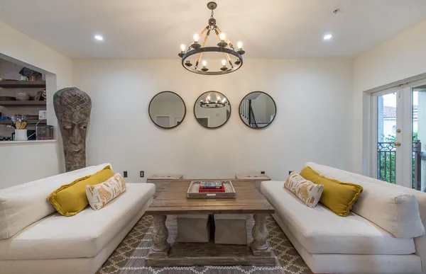a living room with furniture and a window