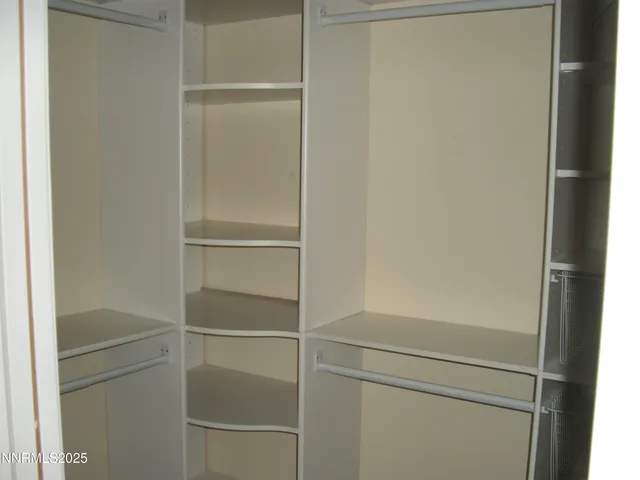 a bathroom with a sink and washer