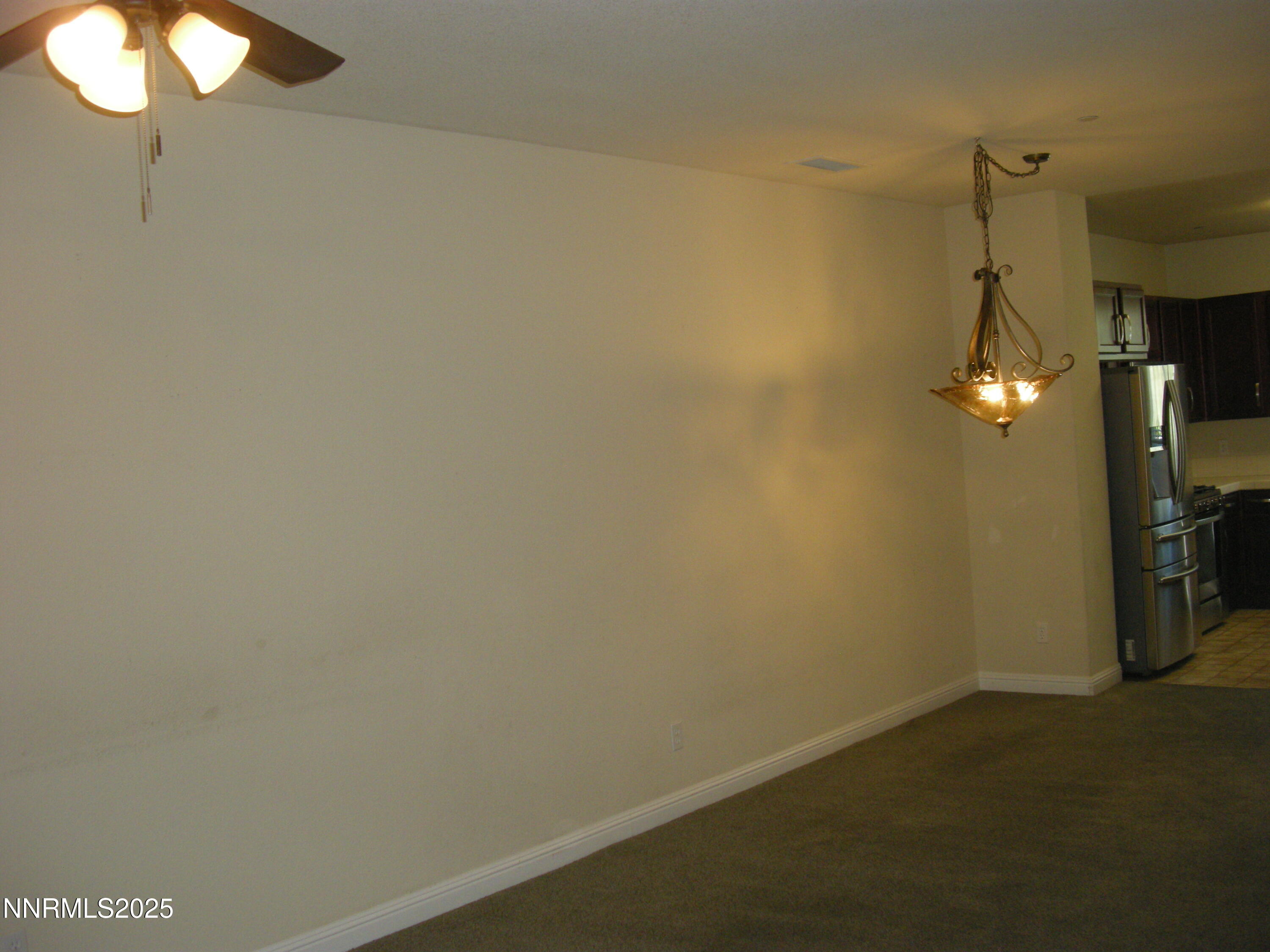 2640 Dana Kristin Lane Reno, NV 89503 - Photo 20 of 24 a view of a room with wooden floor and fan