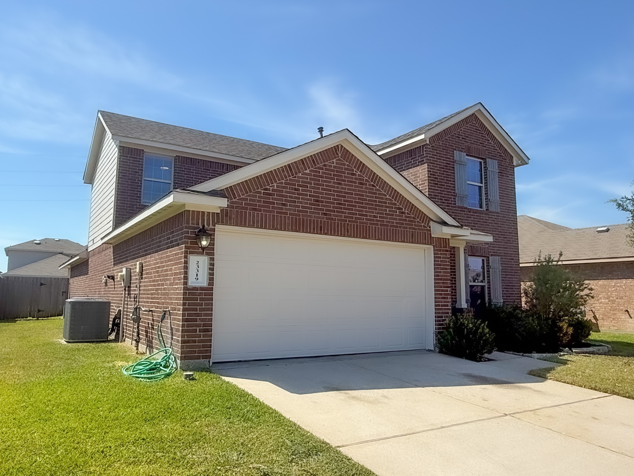 23319 Robbers Nest Drive Spring, TX 77373 - Photo 2 of 42 a view of a house with a yard