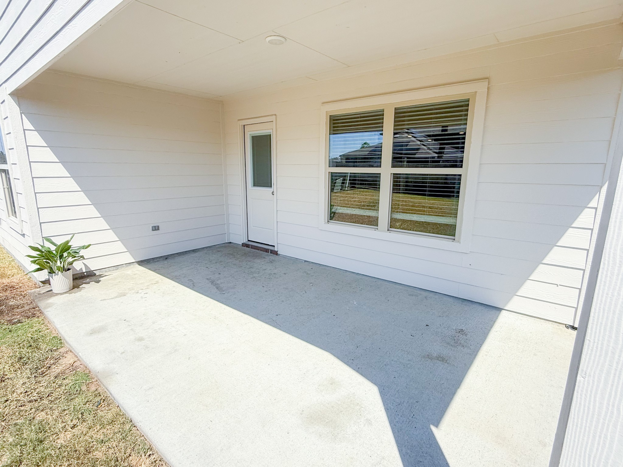 23319 Robbers Nest Drive Spring, TX 77373 - Photo 27 of 42 a view of a room with wooden floor and windows