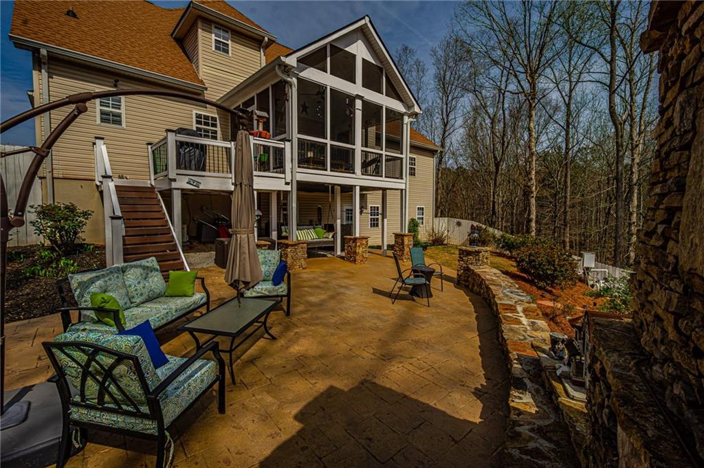 3718 Pebble Creek Point Gainesville, GA 30506 - Photo 103 of 144 a view of a house with backyard and sitting area