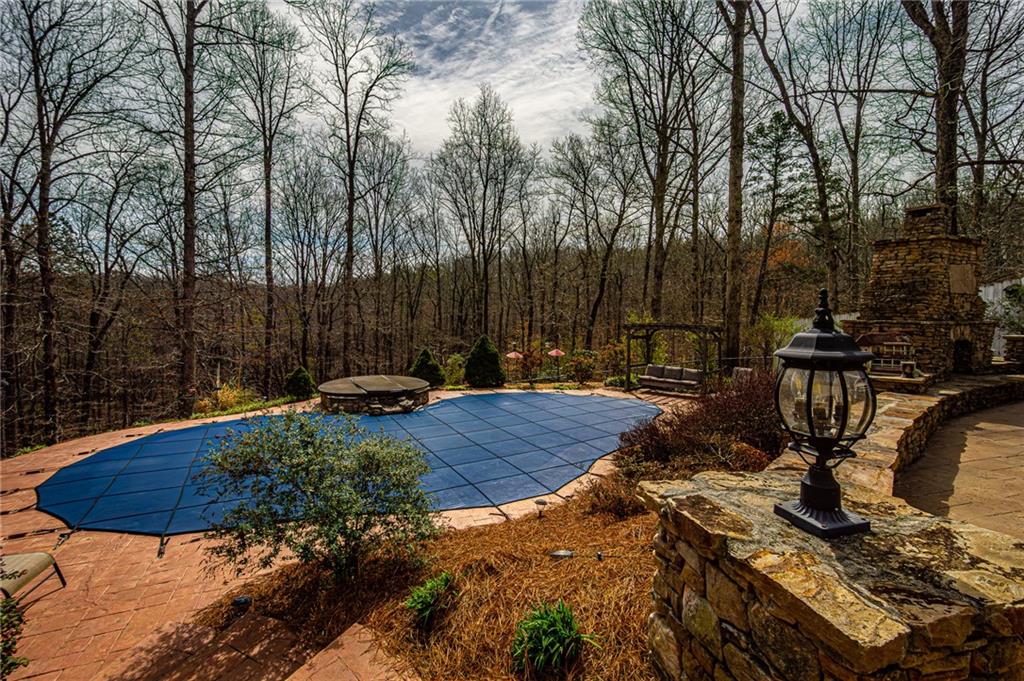 3718 Pebble Creek Point Gainesville, GA 30506 - Photo 109 of 144 a view of a backyard with chairs