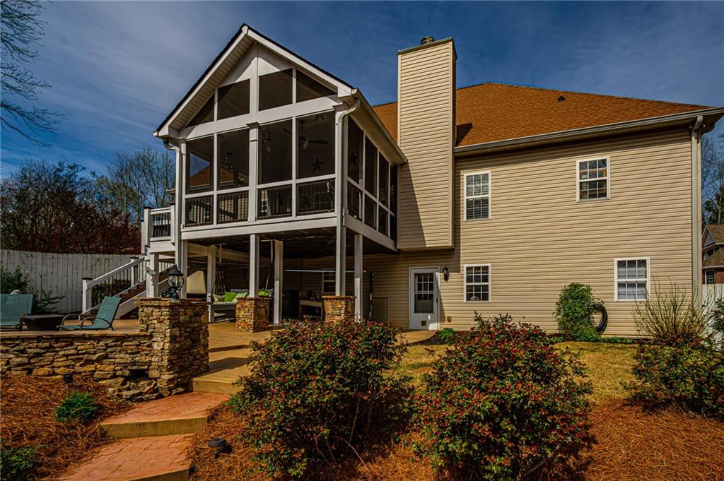 3718 Pebble Creek Point Gainesville, GA 30506 - Photo 114 of 144 a front view of a house with a yard