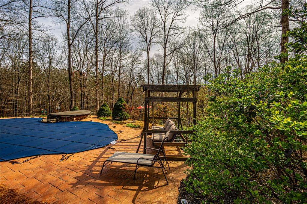 3718 Pebble Creek Point Gainesville, GA 30506 - Photo 127 of 144 a backyard of a house with lots of green space