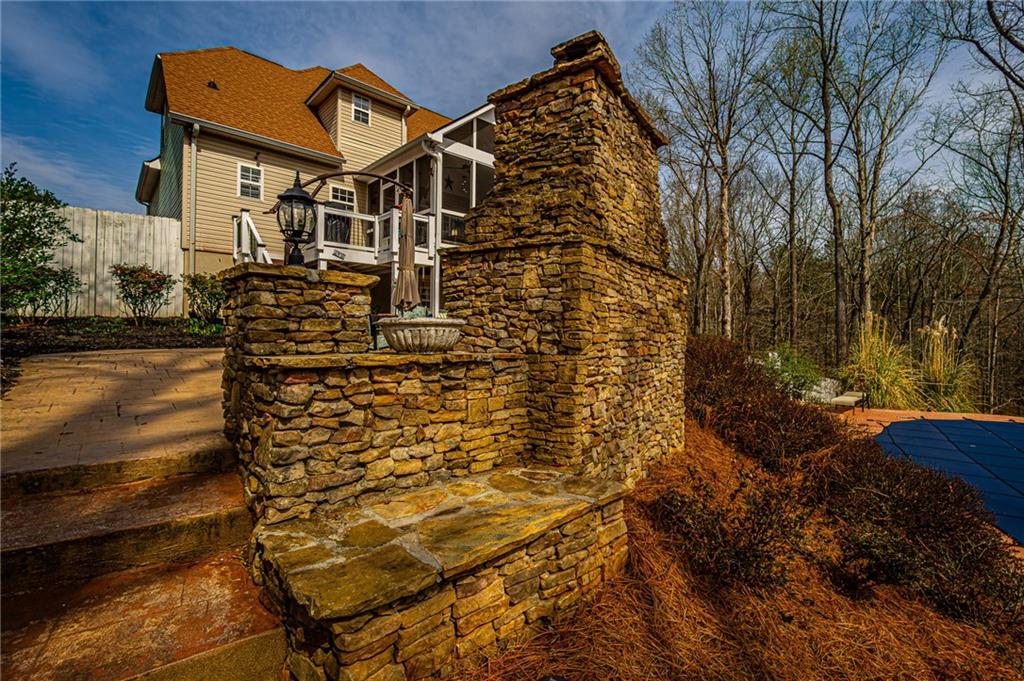 3718 Pebble Creek Point Gainesville, GA 30506 - Photo 128 of 144 a front view of a house with a yard