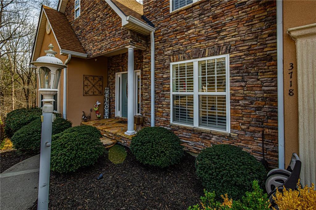 3718 Pebble Creek Point Gainesville, GA 30506 - Photo 138 of 144 a view of a house with backyard and garden