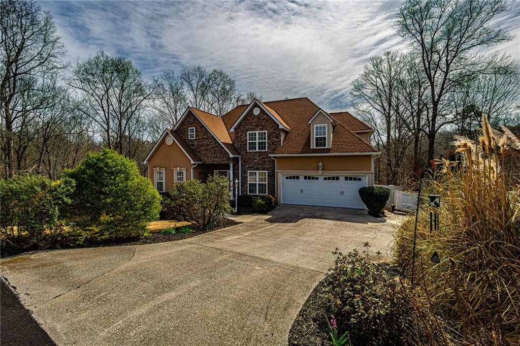 3718 Pebble Creek Point Gainesville, GA 30506 - Photo 143 of 144 a front view of a house with a yard