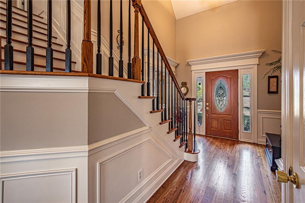 3718 Pebble Creek Point Gainesville, GA 30506 - Photo 30 of 144 a view of entryway and hall with wooden floor