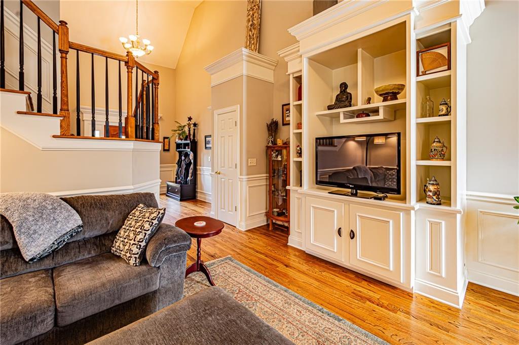 3718 Pebble Creek Point Gainesville, GA 30506 - Photo 31 of 144 a living room with furniture and a flat screen tv
