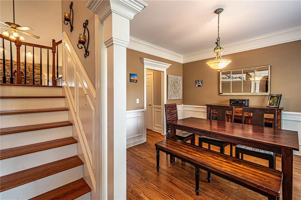 3718 Pebble Creek Point Gainesville, GA 30506 - Photo 35 of 144 a view of a dining room with furniture window and wooden floor