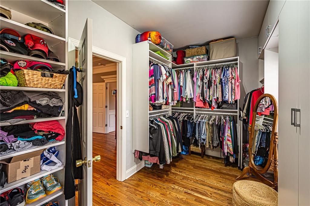 3718 Pebble Creek Point Gainesville, GA 30506 - Photo 47 of 144 a view of walk in closet with clothes