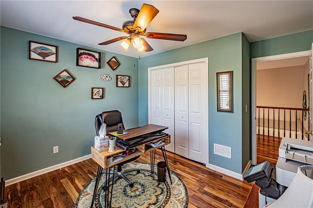 3718 Pebble Creek Point Gainesville, GA 30506 - Photo 59 of 144 a view of workspace with wall paintings and a window
