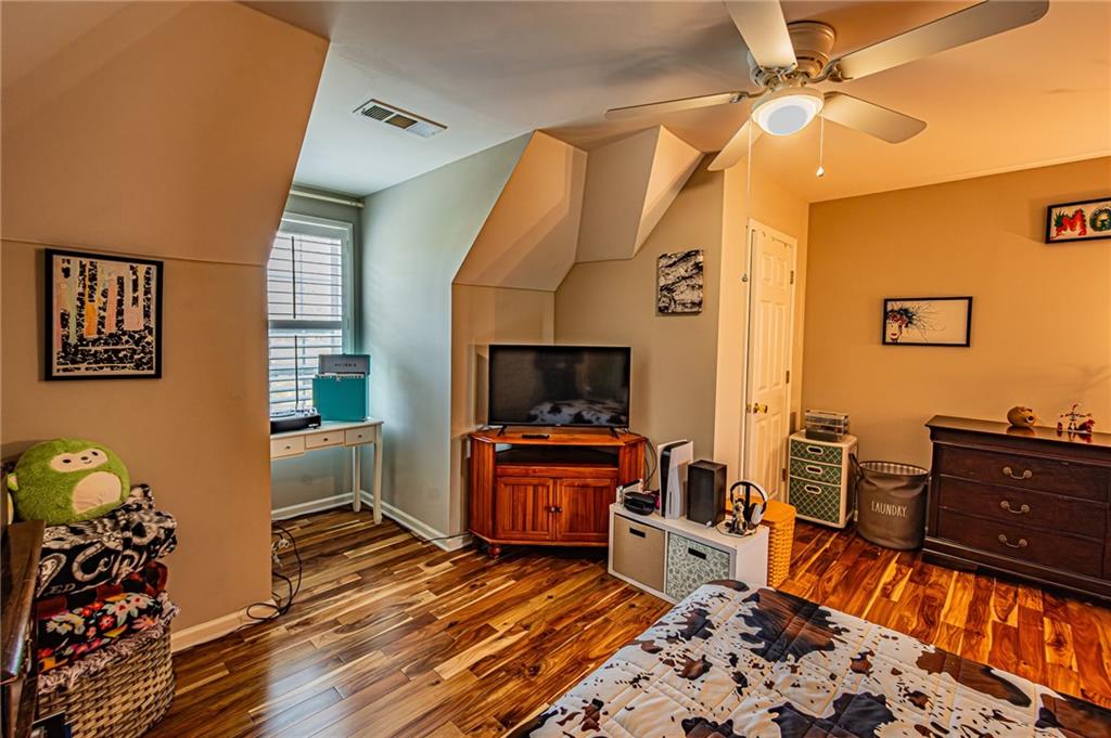 3718 Pebble Creek Point Gainesville, GA 30506 - Photo 62 of 144 a living room with furniture and a flat screen tv
