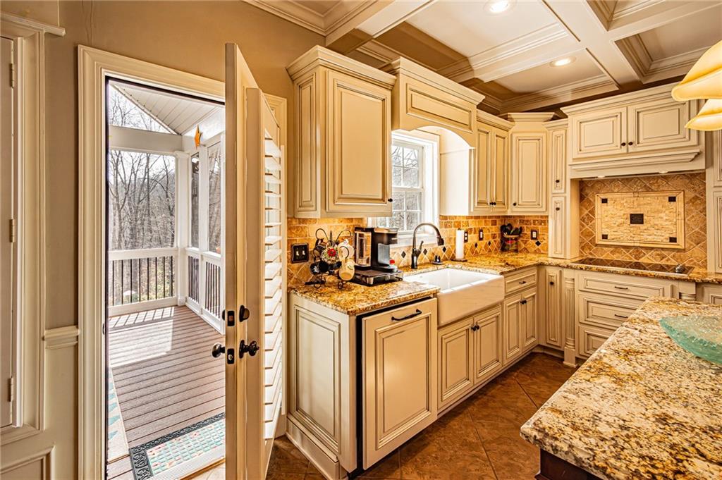 3718 Pebble Creek Point Gainesville, GA 30506 - Photo 71 of 144 a kitchen with stainless steel appliances granite countertop a stove and a sink
