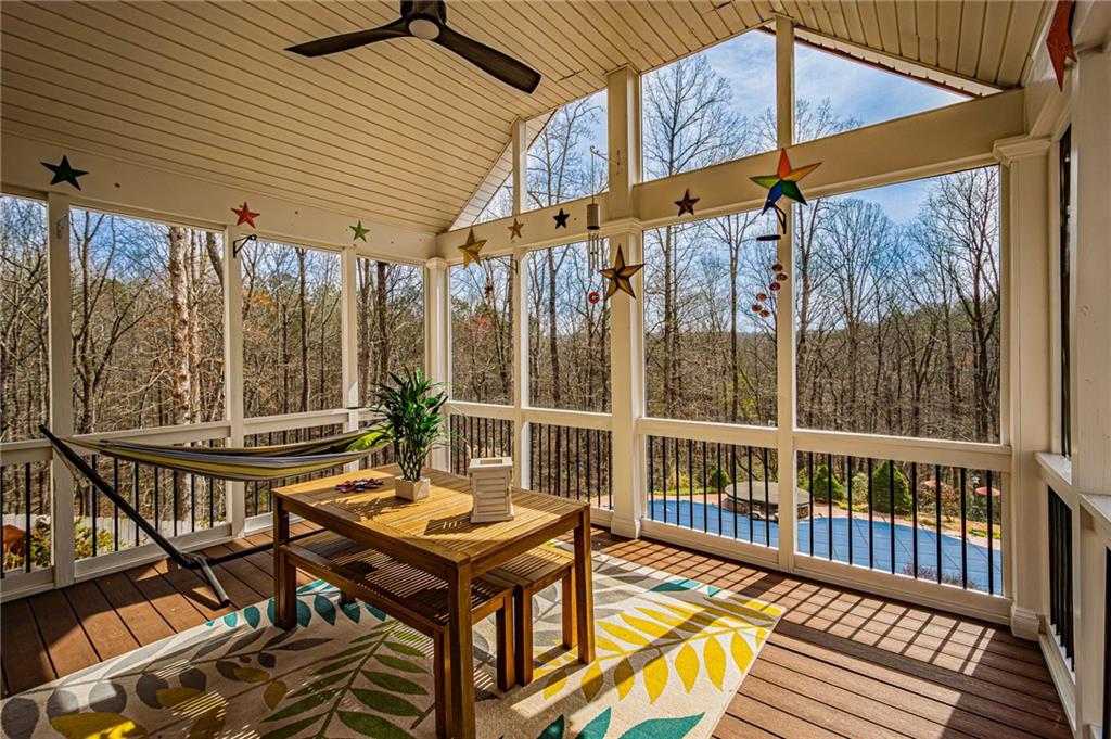 3718 Pebble Creek Point Gainesville, GA 30506 - Photo 72 of 144 a view of a patio with a table and chairs