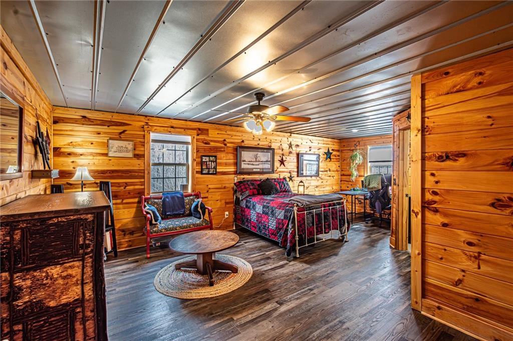 3718 Pebble Creek Point Gainesville, GA 30506 - Photo 82 of 144 a bedroom with furniture window and outdoor view