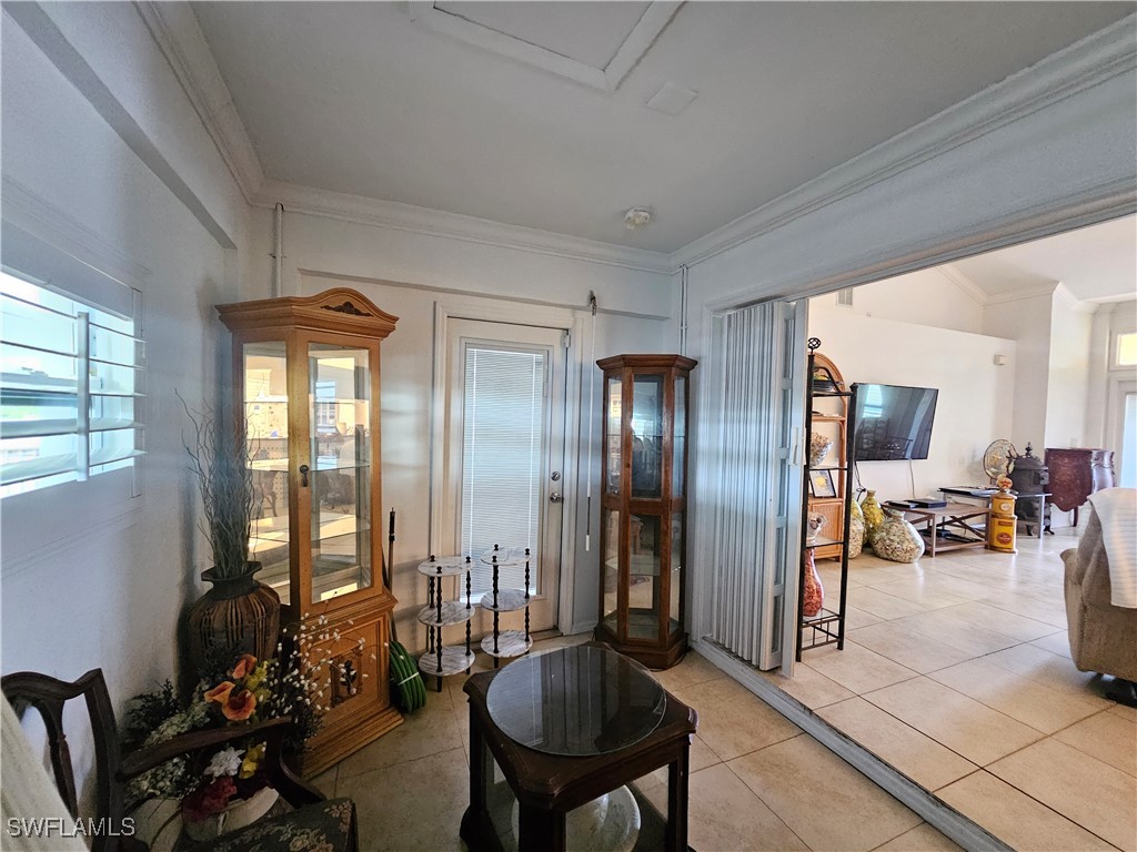 3903 1st Street Southwest Lehigh Acres, FL 33976 - Photo 13 of 25 a view of a livingroom with furniture and windows