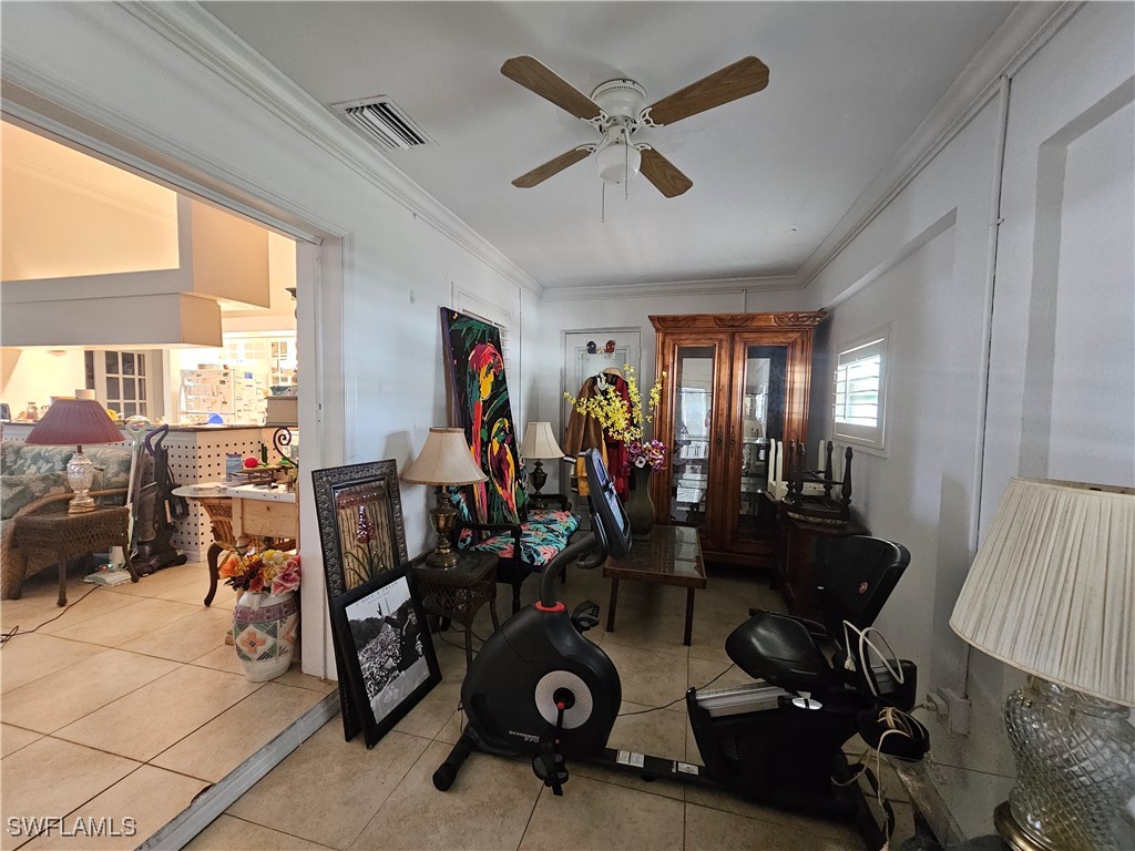 3903 1st Street Southwest Lehigh Acres, FL 33976 - Photo 14 of 25 a view of a livingroom with furniture and a window