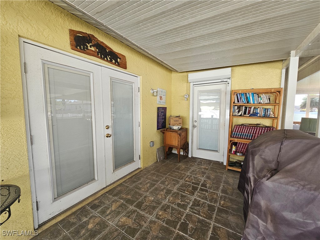 3903 1st Street Southwest Lehigh Acres, FL 33976 - Photo 18 of 25 a very nice looking room with a large window and walk in closet