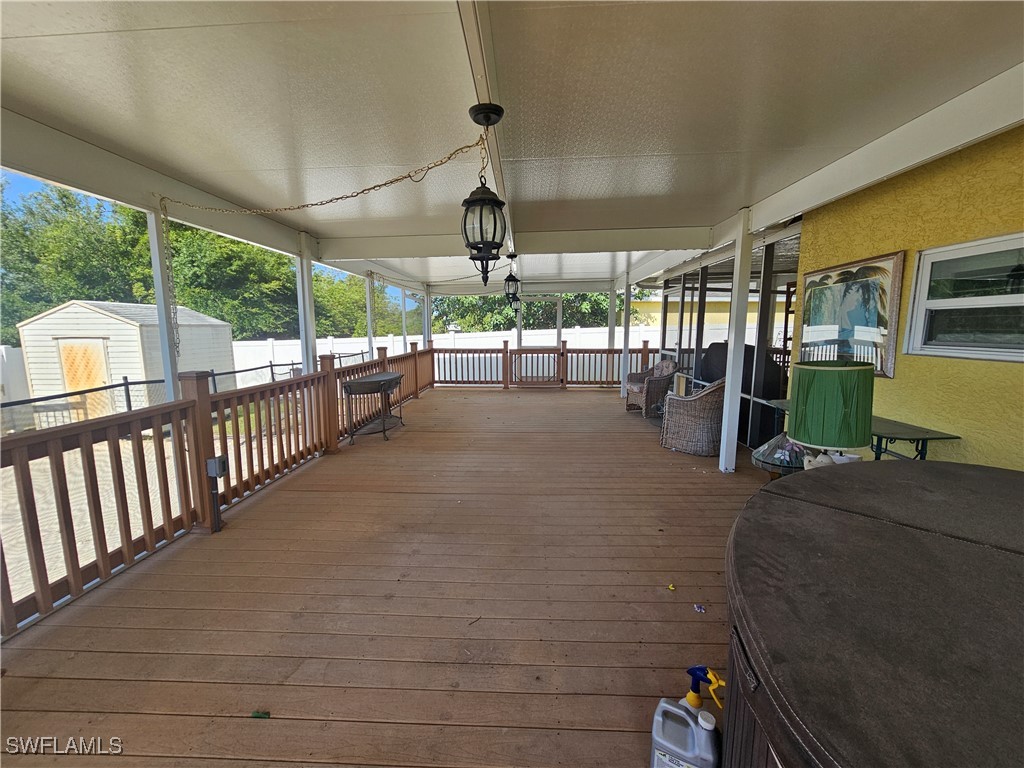 3903 1st Street Southwest Lehigh Acres, FL 33976 - Photo 19 of 25 a view of a porch with furniture