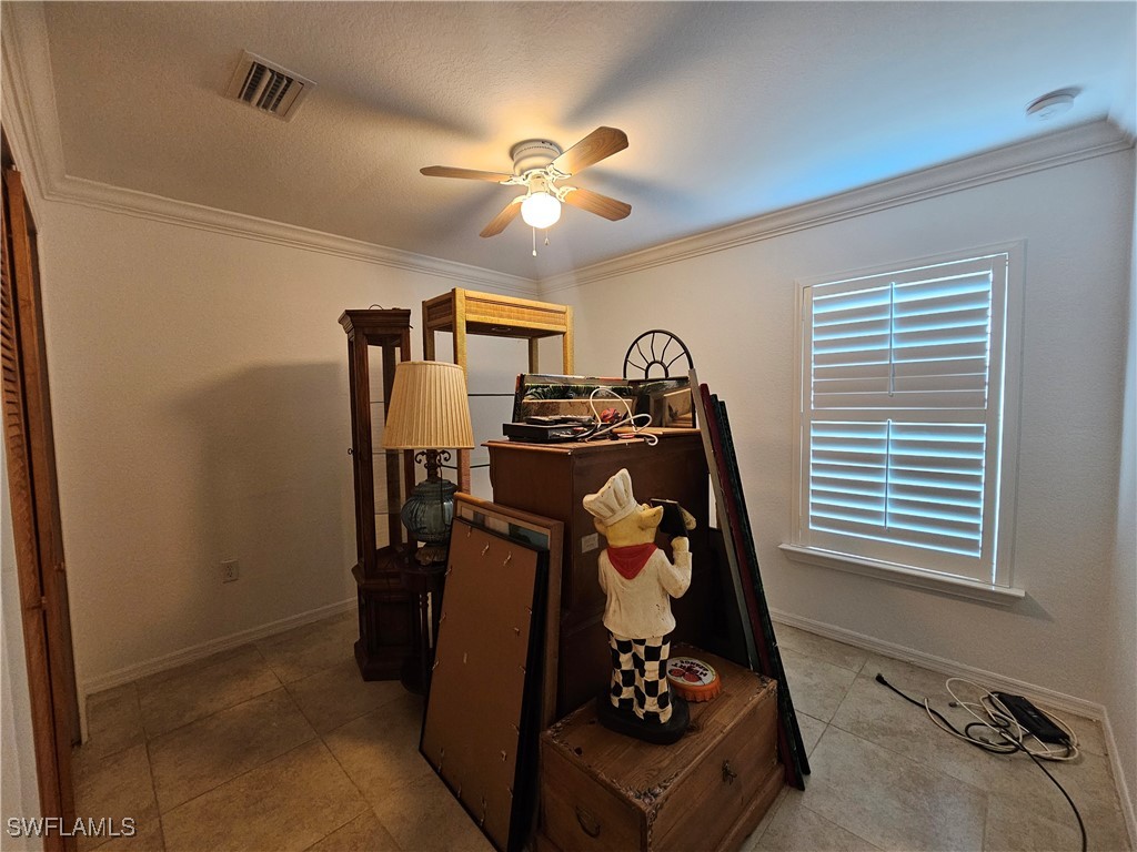 3903 1st Street Southwest Lehigh Acres, FL 33976 - Photo 9 of 25 a room with storage and utility