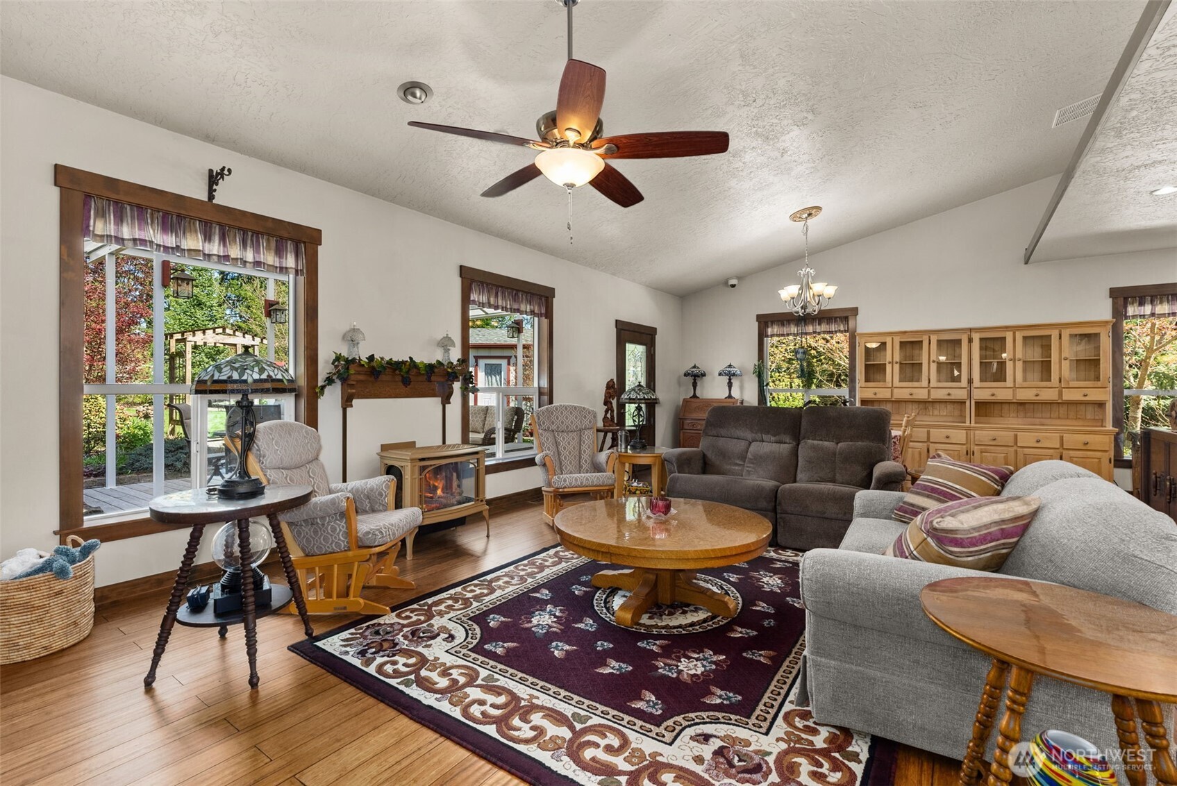 139 Ramsey Road Chehalis, WA 98532 - Photo 11 of 40 a living room with furniture a rug and a large window