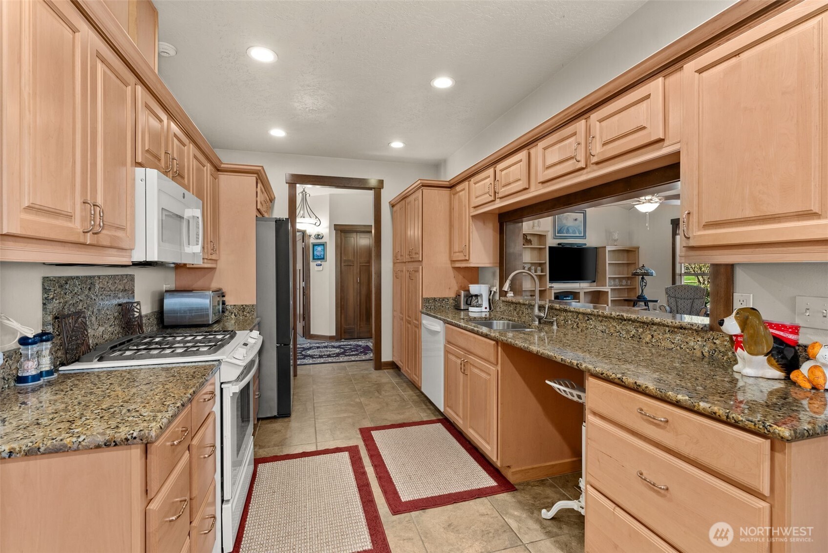 139 Ramsey Road Chehalis, WA 98532 - Photo 13 of 40 a kitchen with stainless steel appliances granite countertop a sink stove and refrigerator