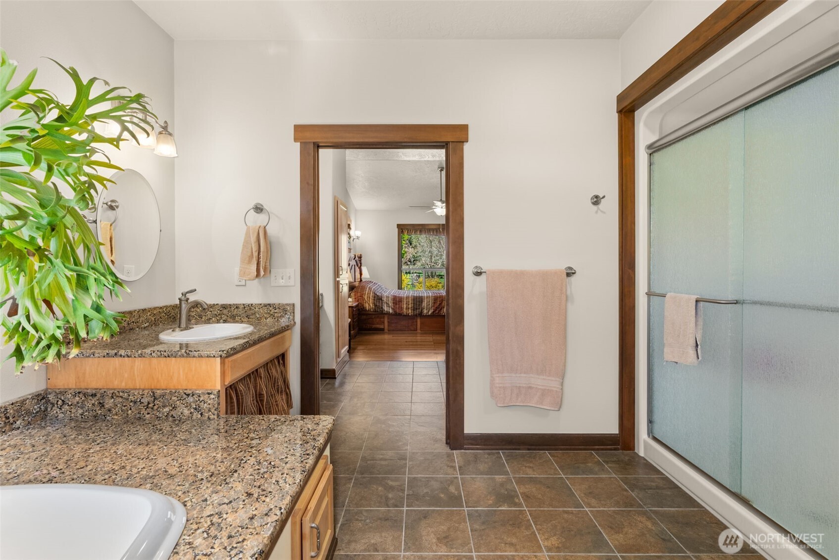 139 Ramsey Road Chehalis, WA 98532 - Photo 19 of 40 a bathroom with a granite countertop tub and a sink