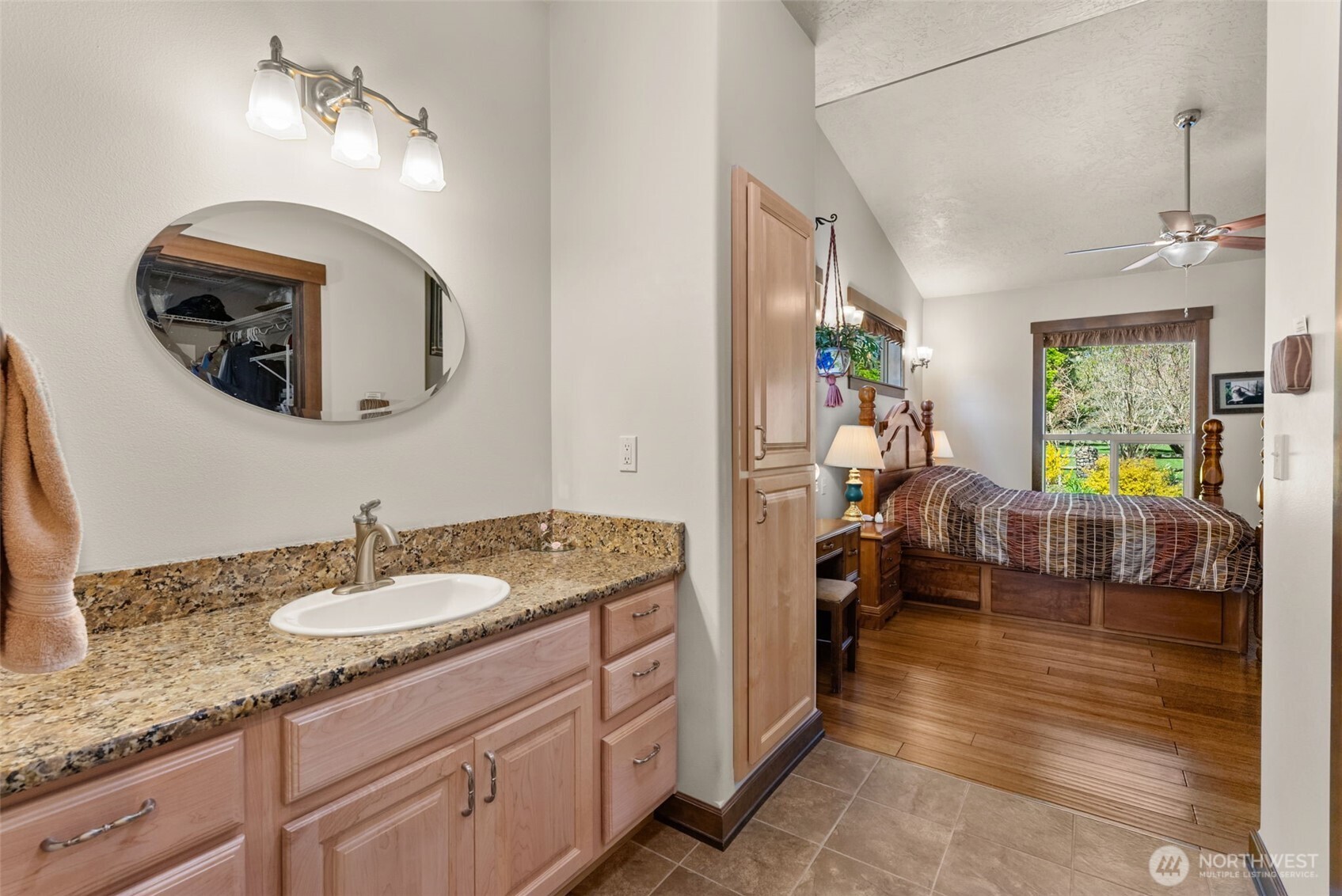 139 Ramsey Road Chehalis, WA 98532 - Photo 20 of 40 a en suite bathroom with a granite countertop sink and a mirror