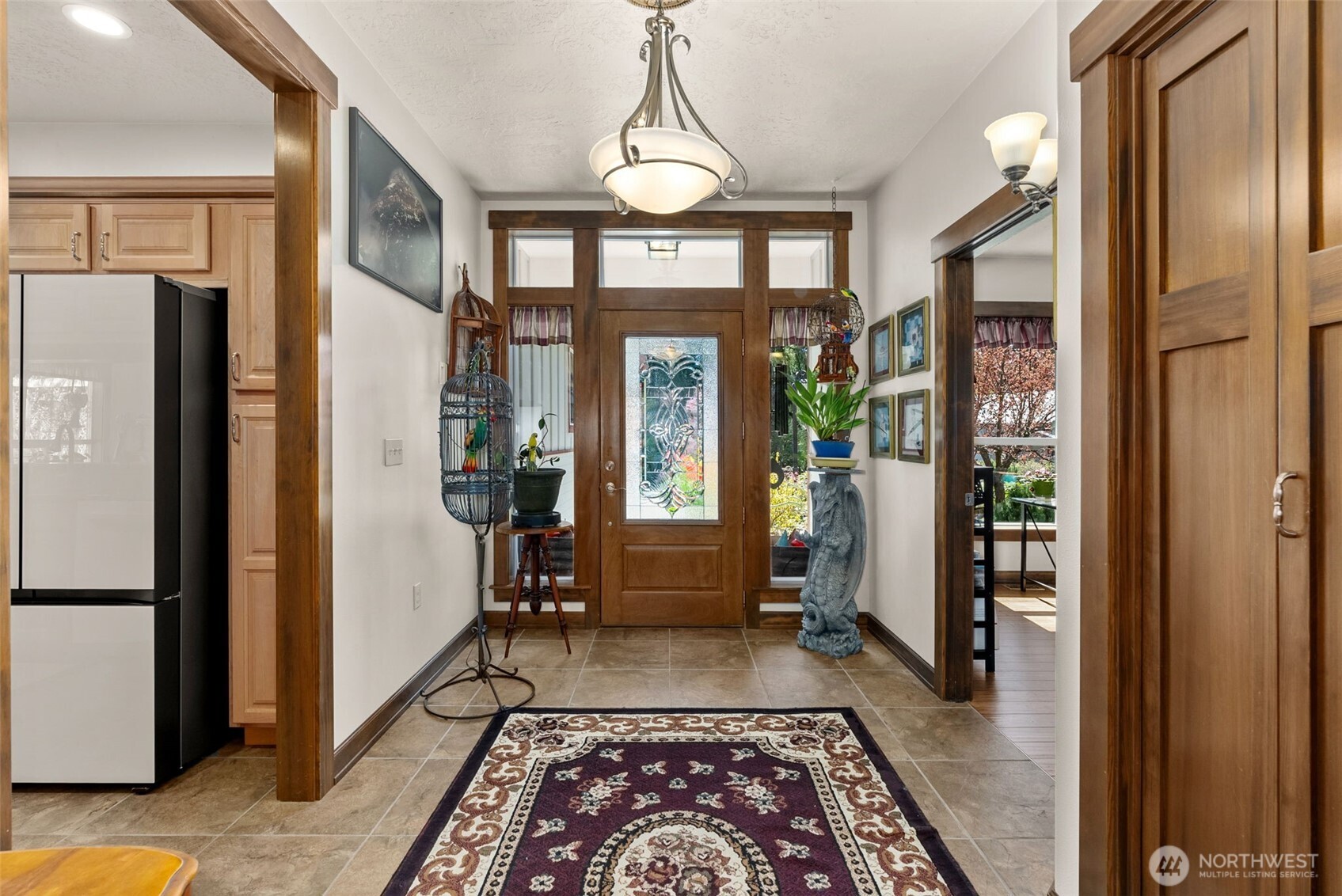 139 Ramsey Road Chehalis, WA 98532 - Photo 8 of 40 a view of hallway with furniture and a chandelier
