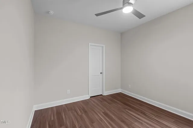 a aerial view of a house with a yard