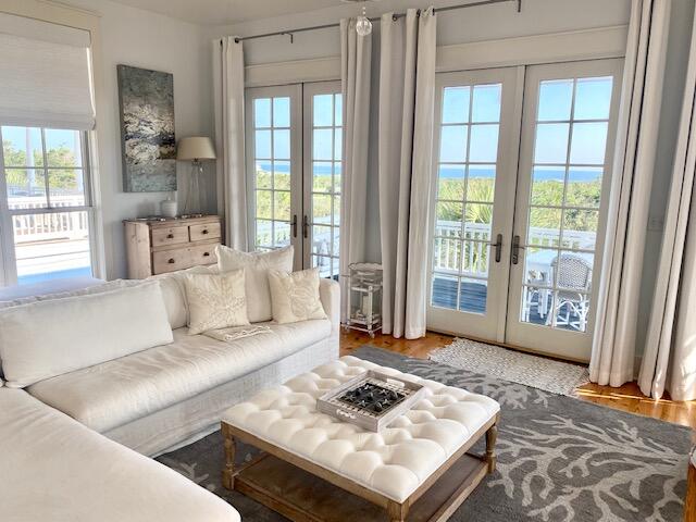 a living room with furniture and a window