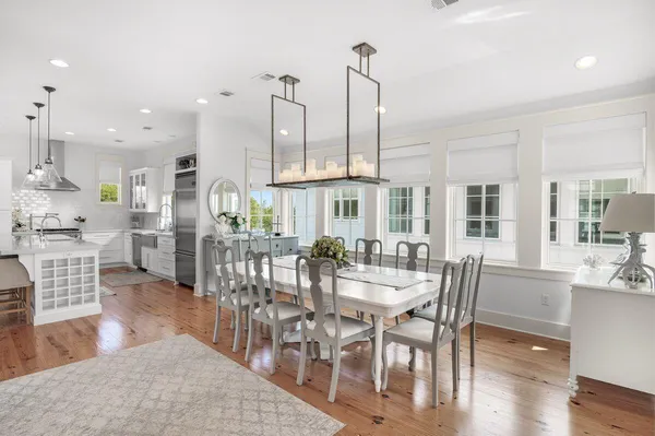a white bath tub sitting in front of a window