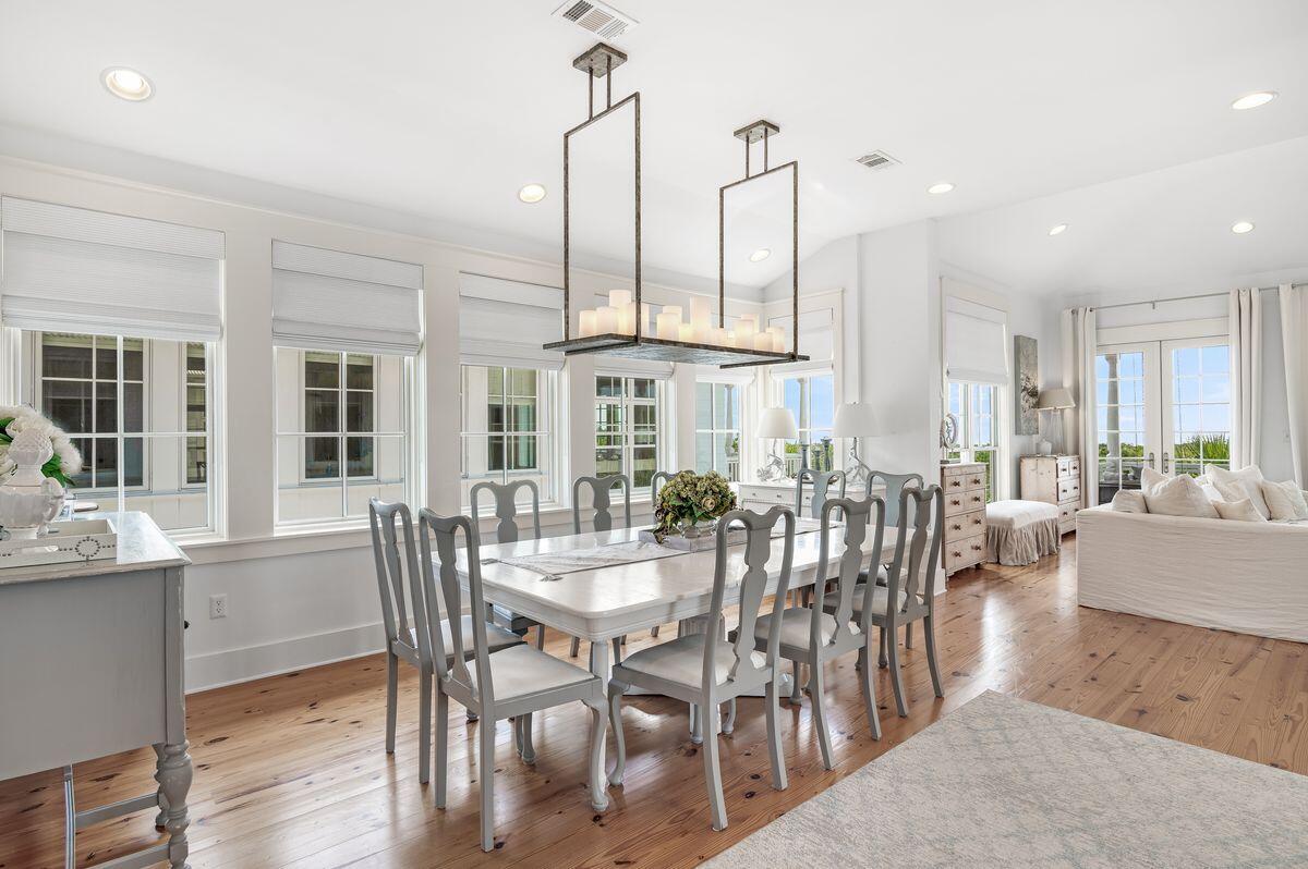 187 Cypress Drive Santa Rosa Beach, FL 32459 - Photo 19 of 58 a view of a dining room with furniture window and wooden floor