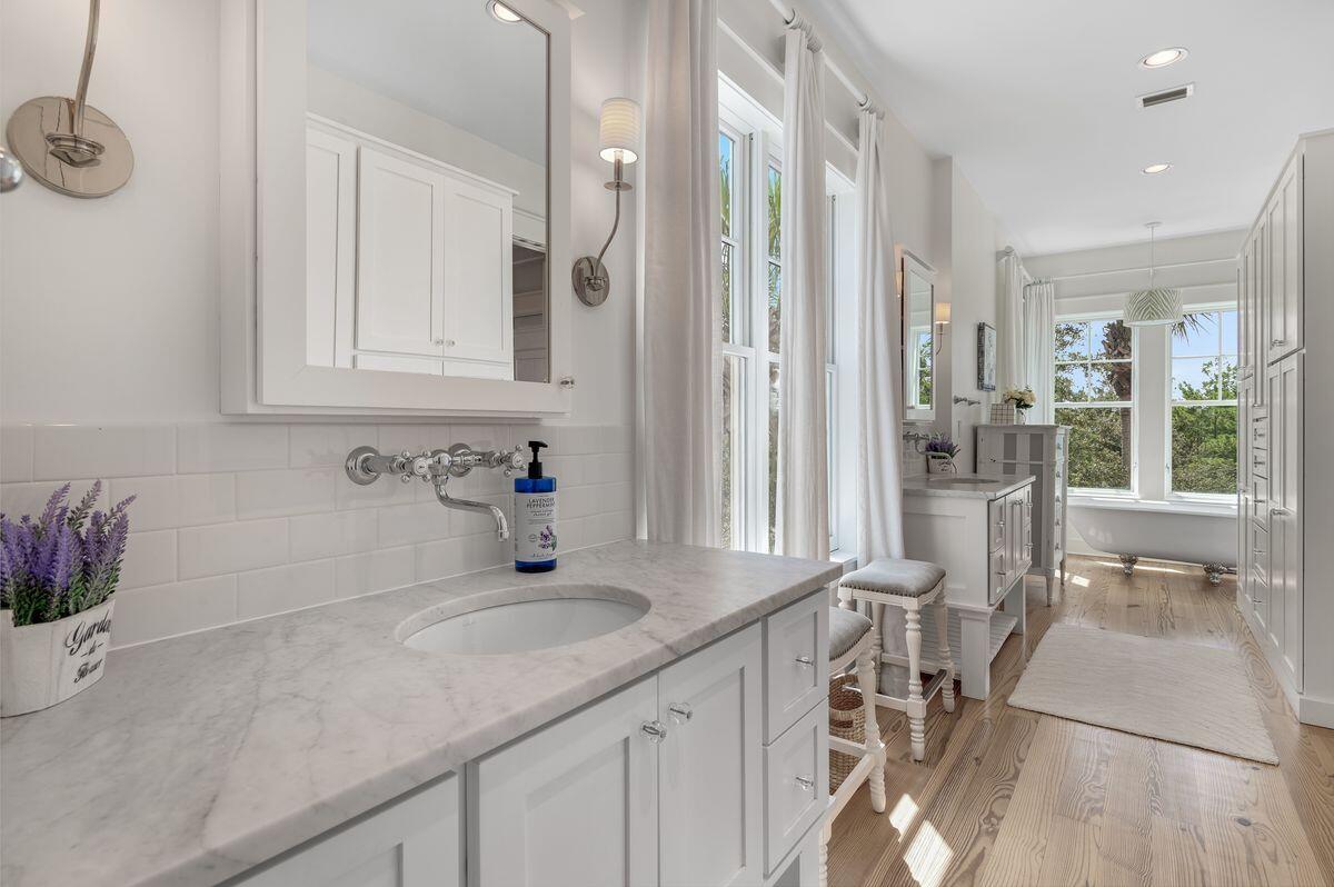 187 Cypress Drive Santa Rosa Beach, FL 32459 - Photo 29 of 58 a kitchen with stainless steel appliances granite countertop a sink and cabinets