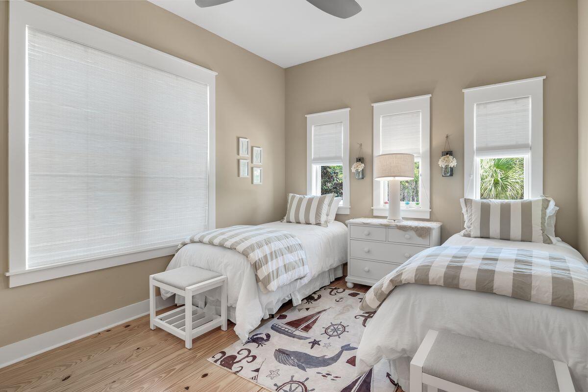 187 Cypress Drive Santa Rosa Beach, FL 32459 - Photo 33 of 58 a bedroom with two beds and a window