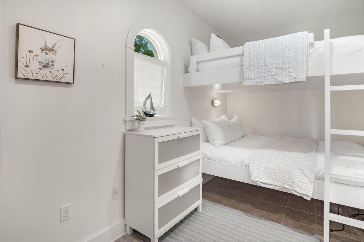 187 Cypress Drive Santa Rosa Beach, FL 32459 - Photo 36 of 58 a bedroom with a bed and a painting on the wall