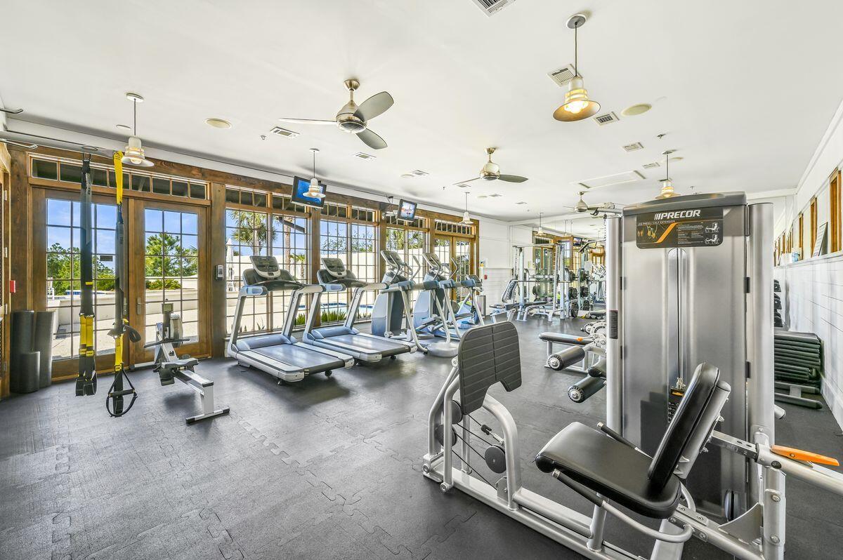 187 Cypress Drive Santa Rosa Beach, FL 32459 - Photo 52 of 58 a room with gym equipment and a large window