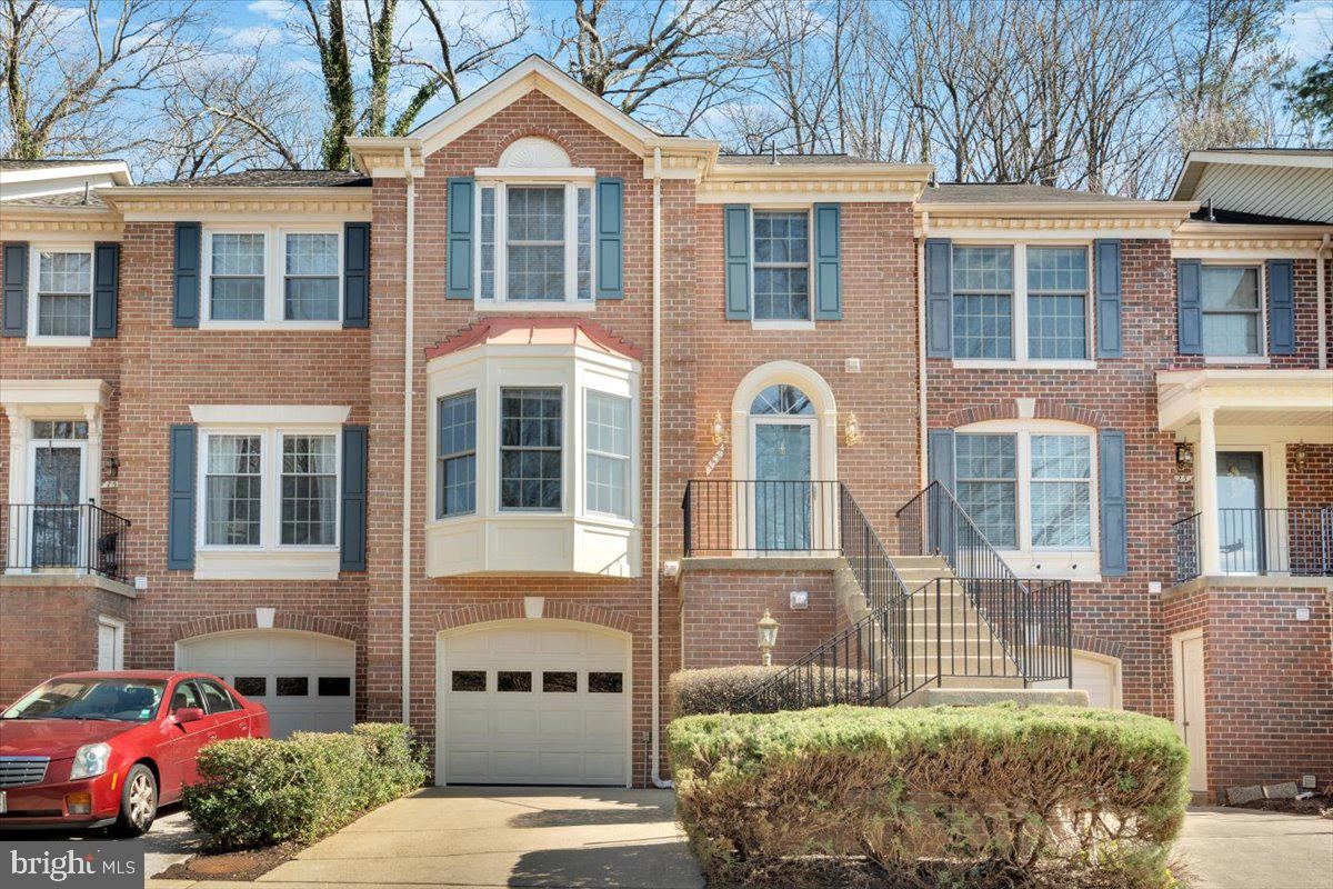 7523 Westmore Drive Springfield, VA 22150 - Photo 1 of 37 a front view of a house with a yard