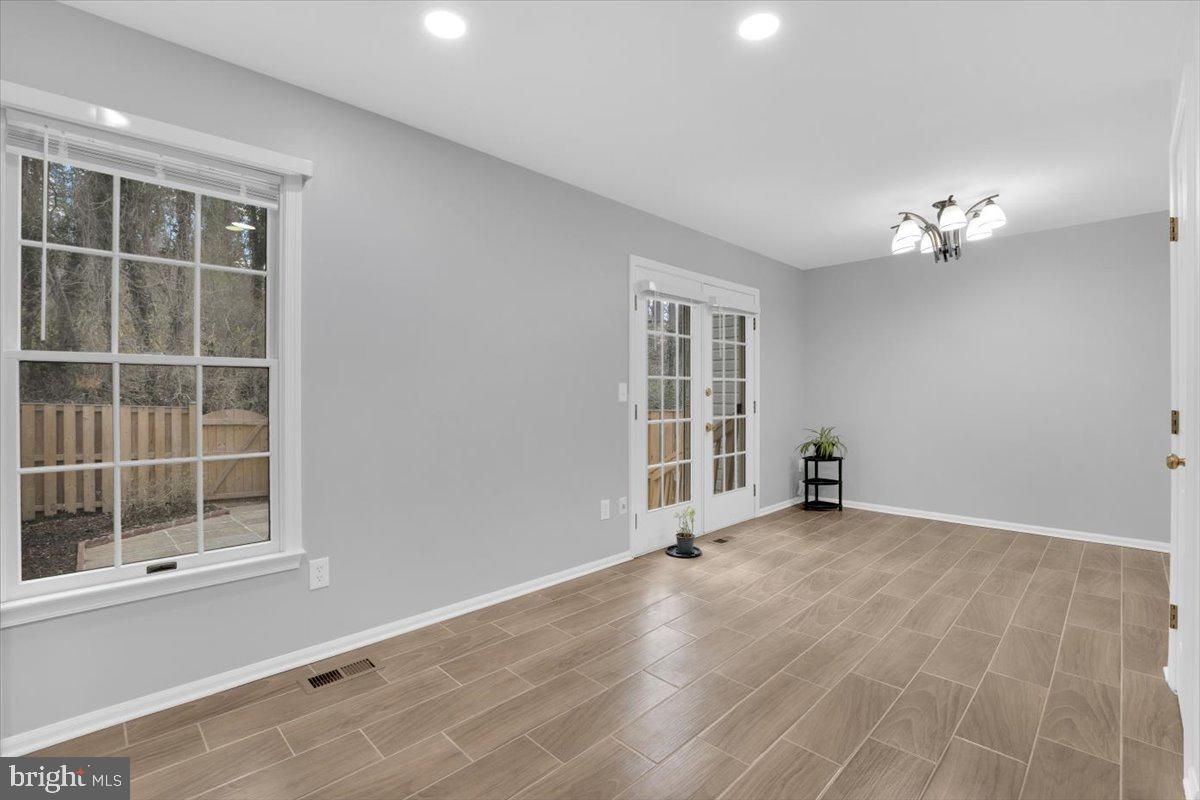 7523 Westmore Drive Springfield, VA 22150 - Photo 12 of 37 a view of an empty room with a window