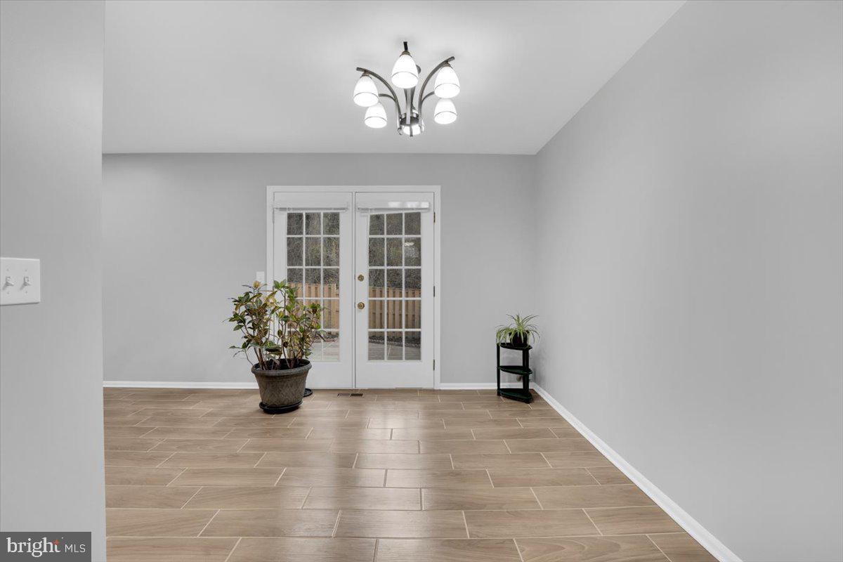 7523 Westmore Drive Springfield, VA 22150 - Photo 13 of 37 a view of an empty room with a window