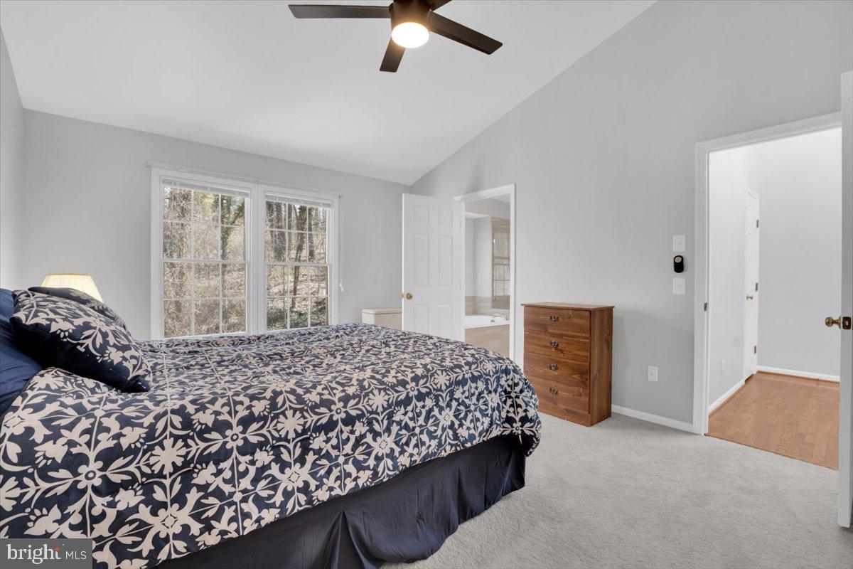 7523 Westmore Drive Springfield, VA 22150 - Photo 16 of 37 a bedroom with bed and window